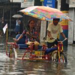 Two dead, thousands evacuated in Philippines rains