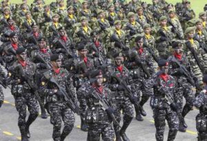 Members of the Special Forces march during the 76th Armed Forces of the Philippines (AFP) anniversary inside the military headquarters of Camp Aguinaldo in Quezon city, metro Manila December 21, 2011. (MNS photo)
