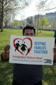 A man with a placard that calls for family reunification at a rally in Washington D.C. last April 11 before U.S. senators unveiled an immigration reform bill that may allow deportees to be reunited with their families. . (Photo from Reform Immigration for America Facebook page)
