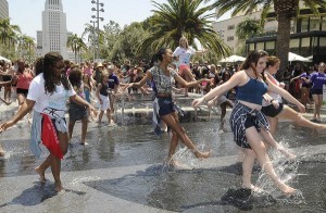 Dancers splash in the fountain at National Dance Day celebration at downtown Los Angeles’ Grand Park. Park visitors joined "So You Think You Can Dance’s" Nigel Lythgoe, Adam Shankman, Napoleon and Tabitha Dumo and other popular dance celebrities as part of a nationwide grassroots initiative that promotes the joy and benefits of dance for everyone. 7/27/2013Los Angeles California, photos courtesy The Music Center